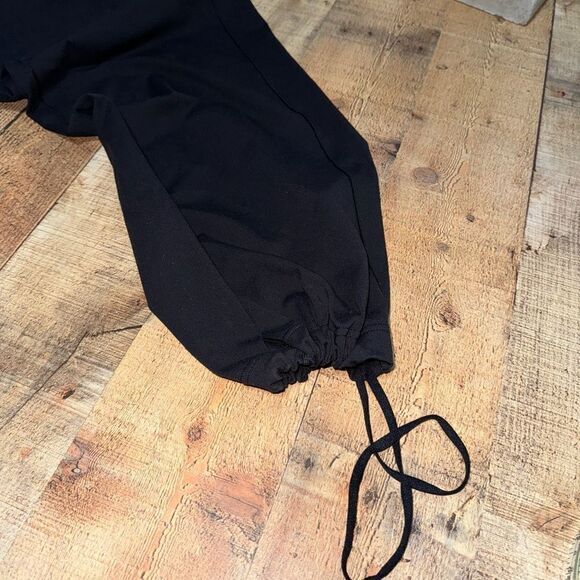 Lululemon Sit In Stillness Pant
Black wide leg drawstring bottom ankles size 10 - Picture 10 of 16